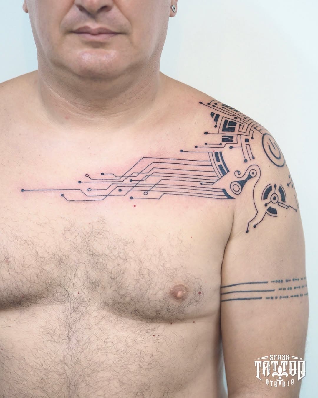Cybernetic blackwork chest and shoulder